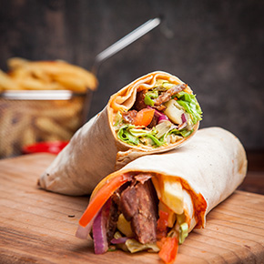 side-view-shawarma-with-fried-potatoes-board-cookware